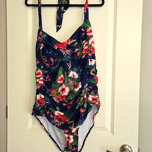 New (hygiene liner intact) halter top style swimsuit.New In Package